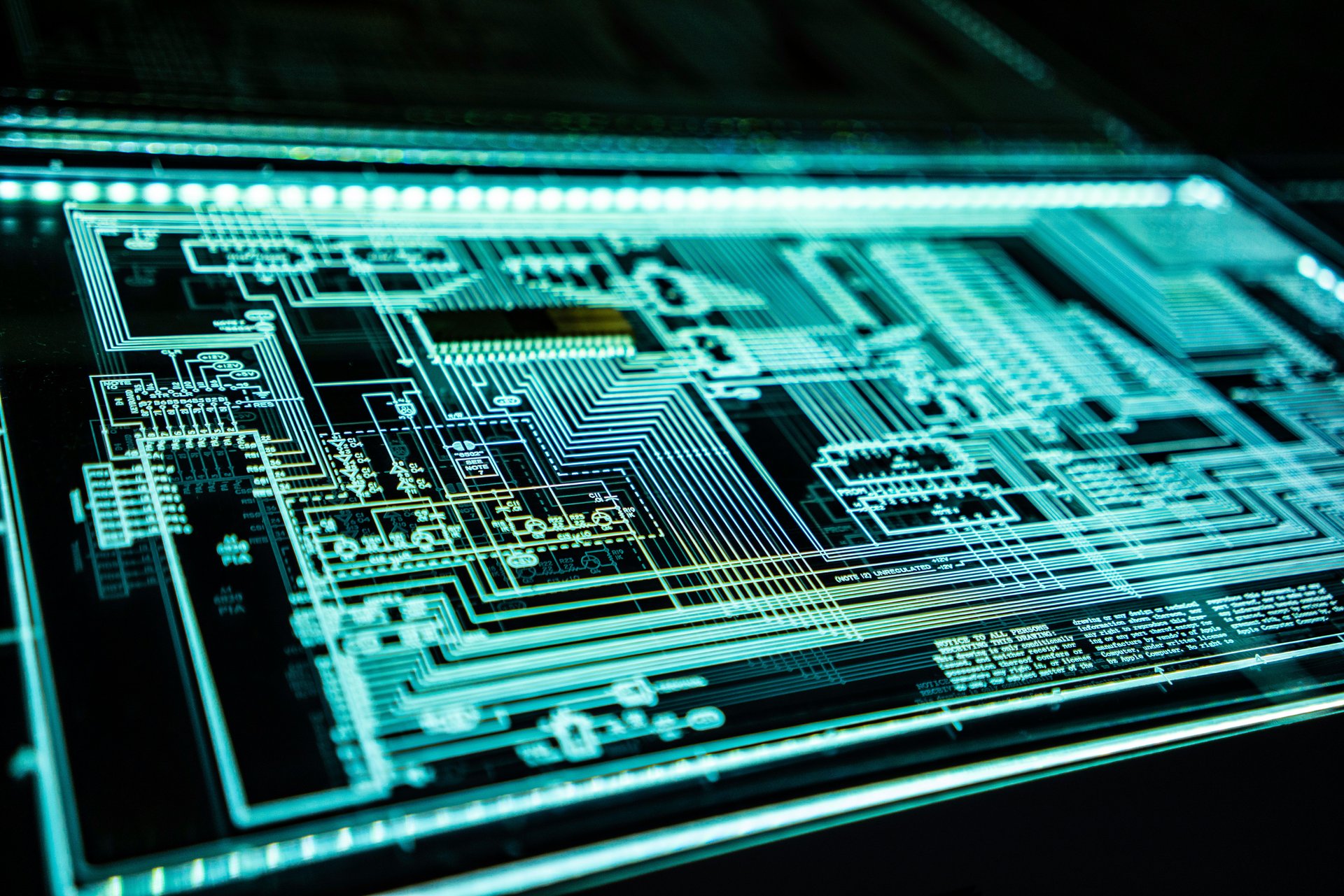 Circuit board glowing diagram representing cyber infrastructure